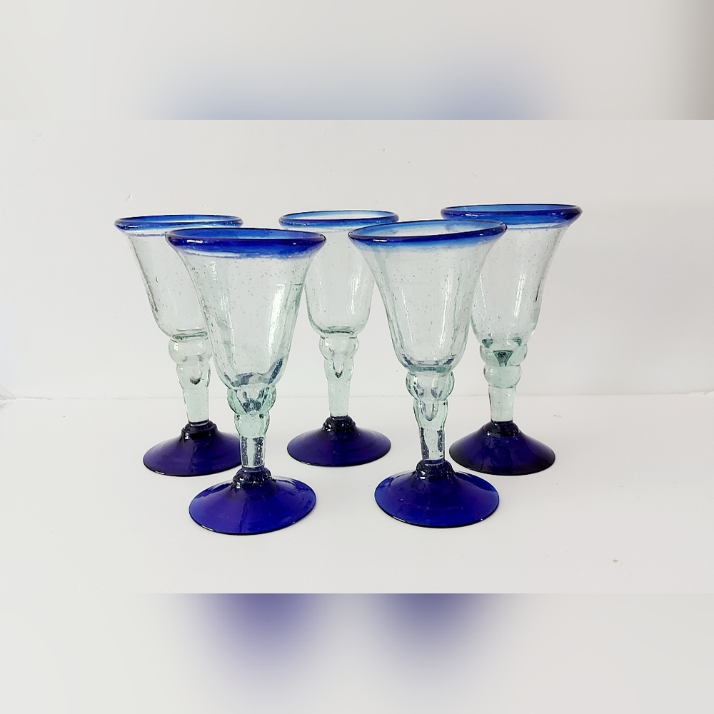 Set of 5 blown glass wine goblets.